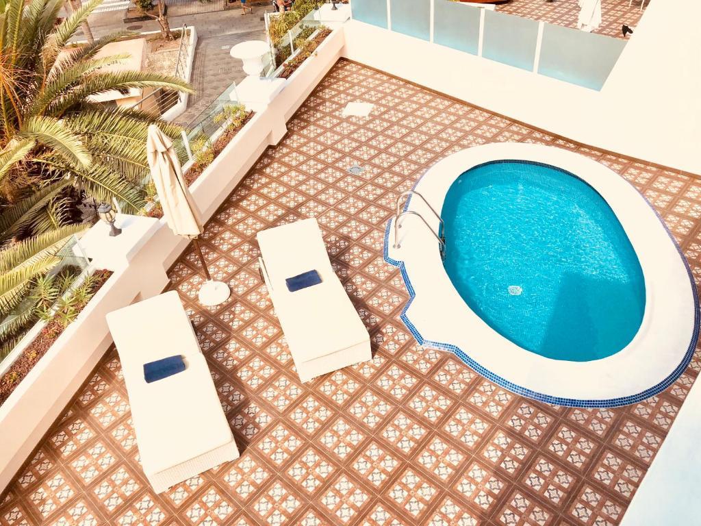 Flamingo Suites Boutique Hotel swim up kamer terras